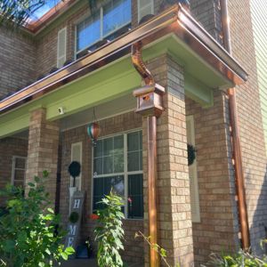 Copper Gutters installed by Superb Gutters and Roofing